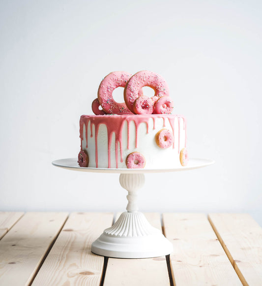 Cake decorated with donuts